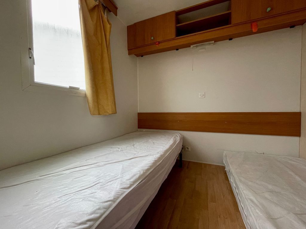 Habitación de Mobil Home con 2 camas